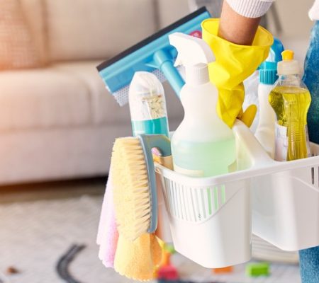 Cleaning,,Hand,And,Basket,Of,Cleaning,Supplies,For,Family,Home